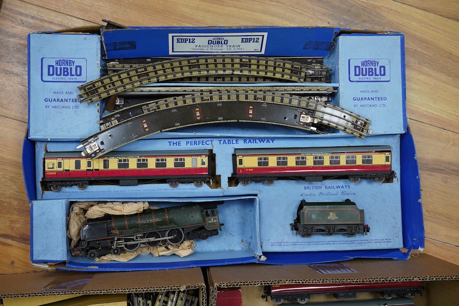 A collection of Hornby Dublo model railway for 3-rail running, including a boxed EDP12 Passenger Train set comprising a Coronation Class Duchess of Montrose locomotive, two bogie coaches, etc., together with eleven addit